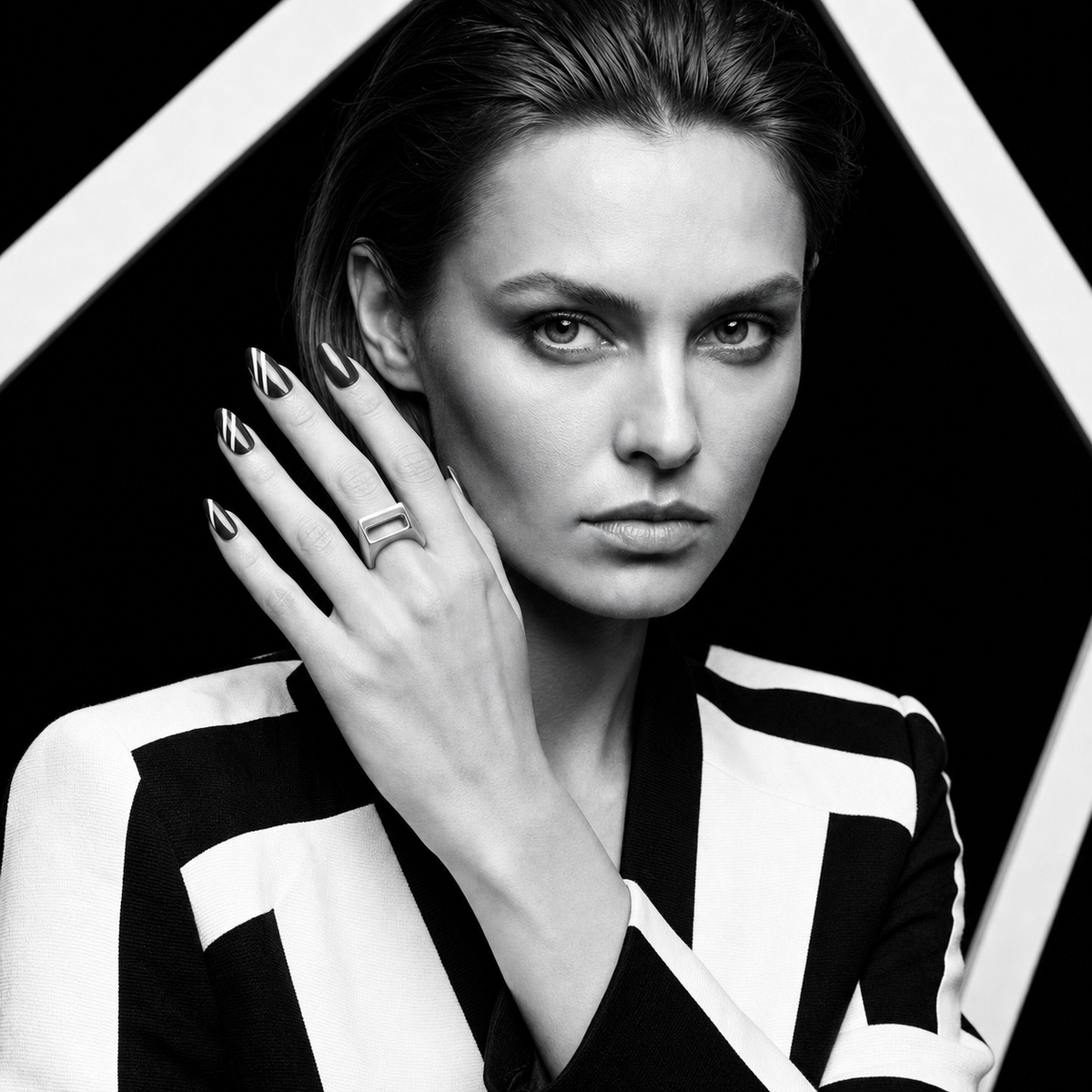 Offset Portal Ring worn in a monochrome editorial portrait