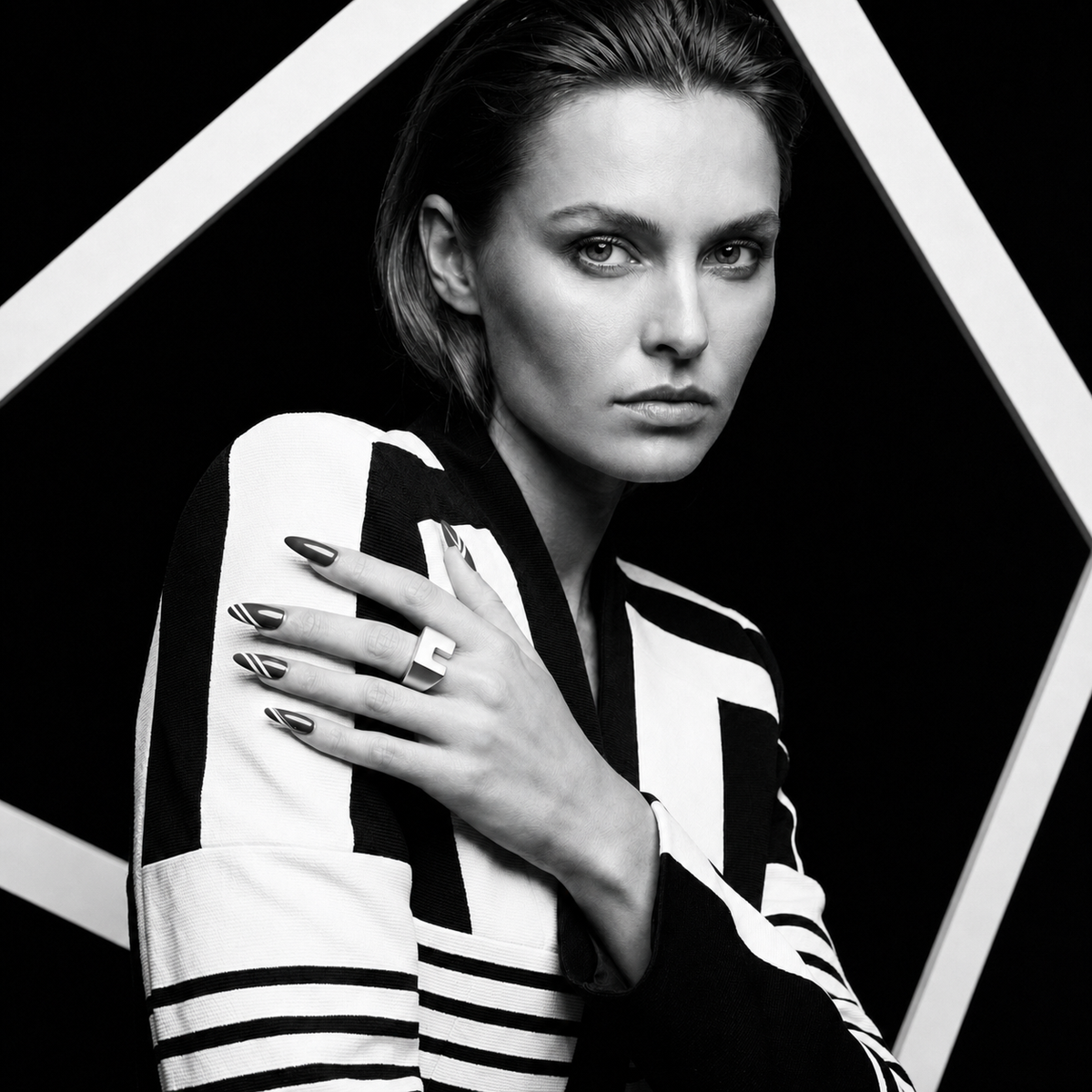 Corner Block Ring worn in a monochrome editorial portrait