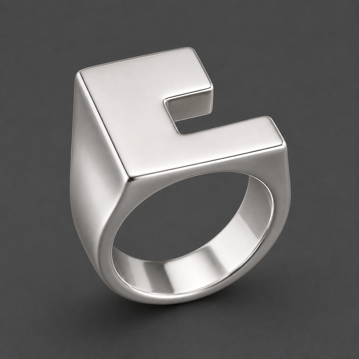 Corner Block Ring in sterling silver on a neutral studio background